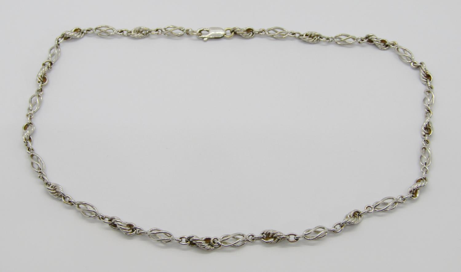 9ct white gold fancy twist link chain necklace, with later 18ct white gold lobster clasp, 41.5cm L