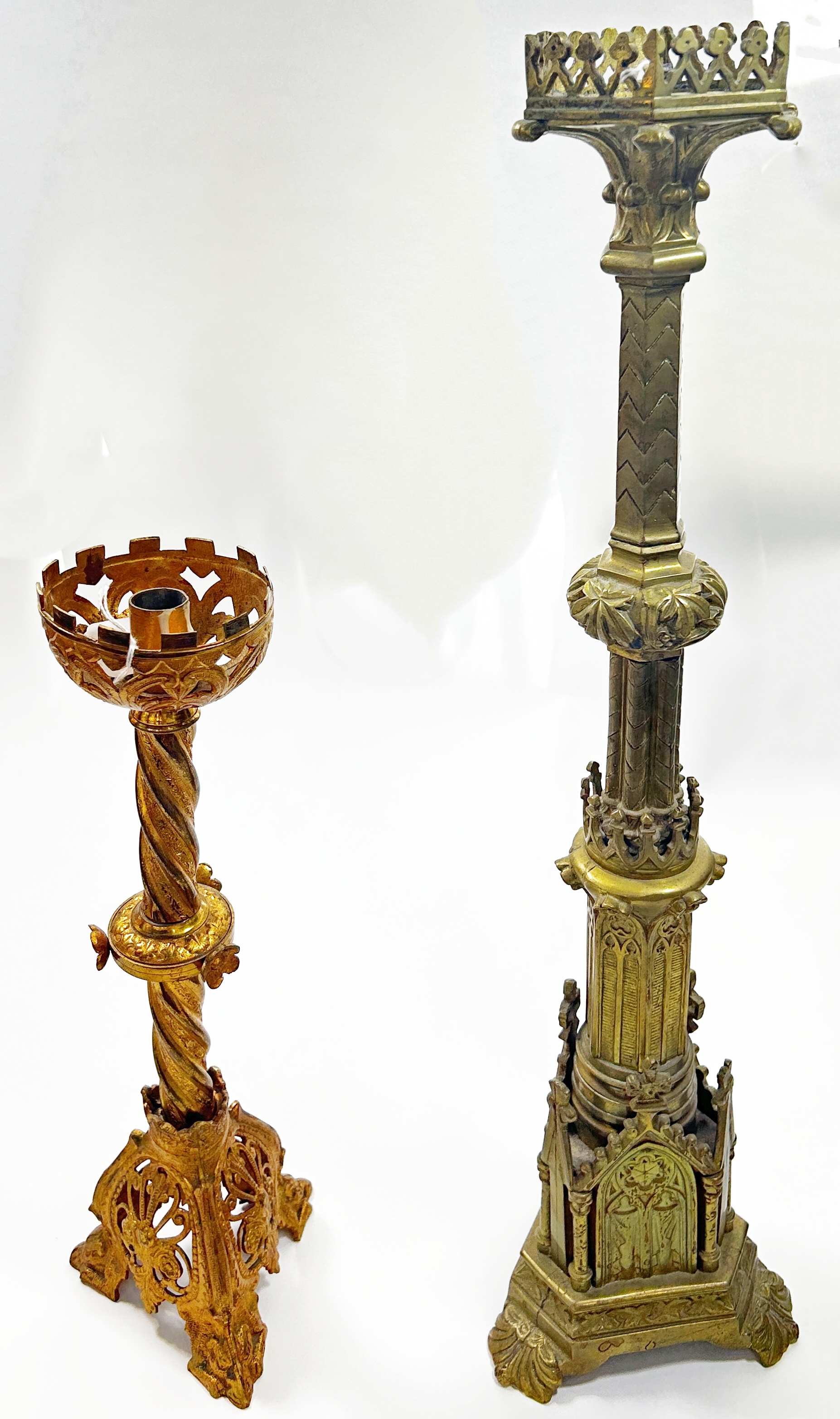 A 19th century ecclesiastical brass pricket candlestick of Puginesque form, with pierced hexagonal