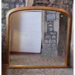 A Victorian style over mantle mirror with bevelled edge plate and moulded gilded frame, 103cm x