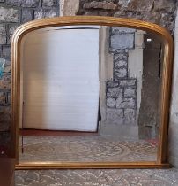 A Victorian style over mantle mirror with bevelled edge plate and moulded gilded frame, 103cm x