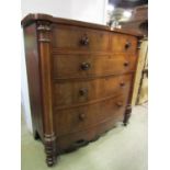 A Victorian mahogany bow front chest of three long and two short drawers with column supports, 128cm