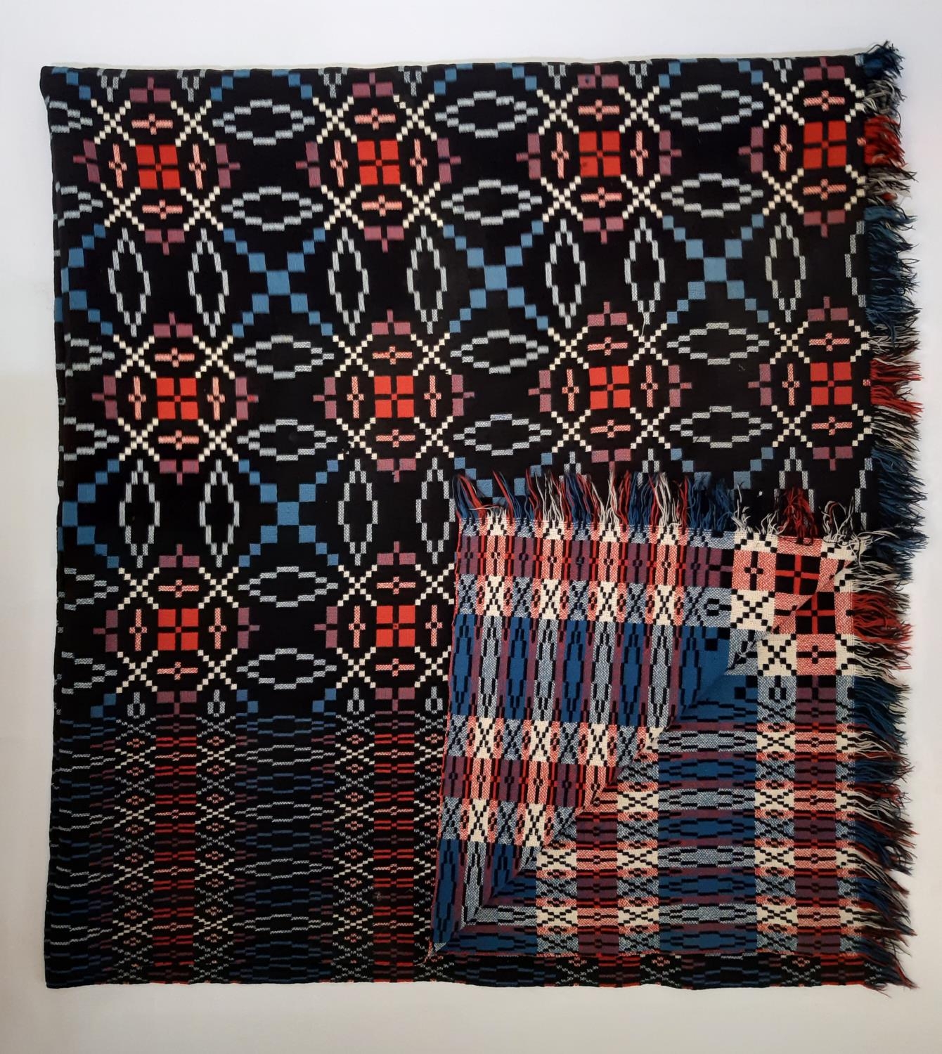 Traditional Welsh woollen blanket in reversible weave in red, blue, black and white, 240x220cm