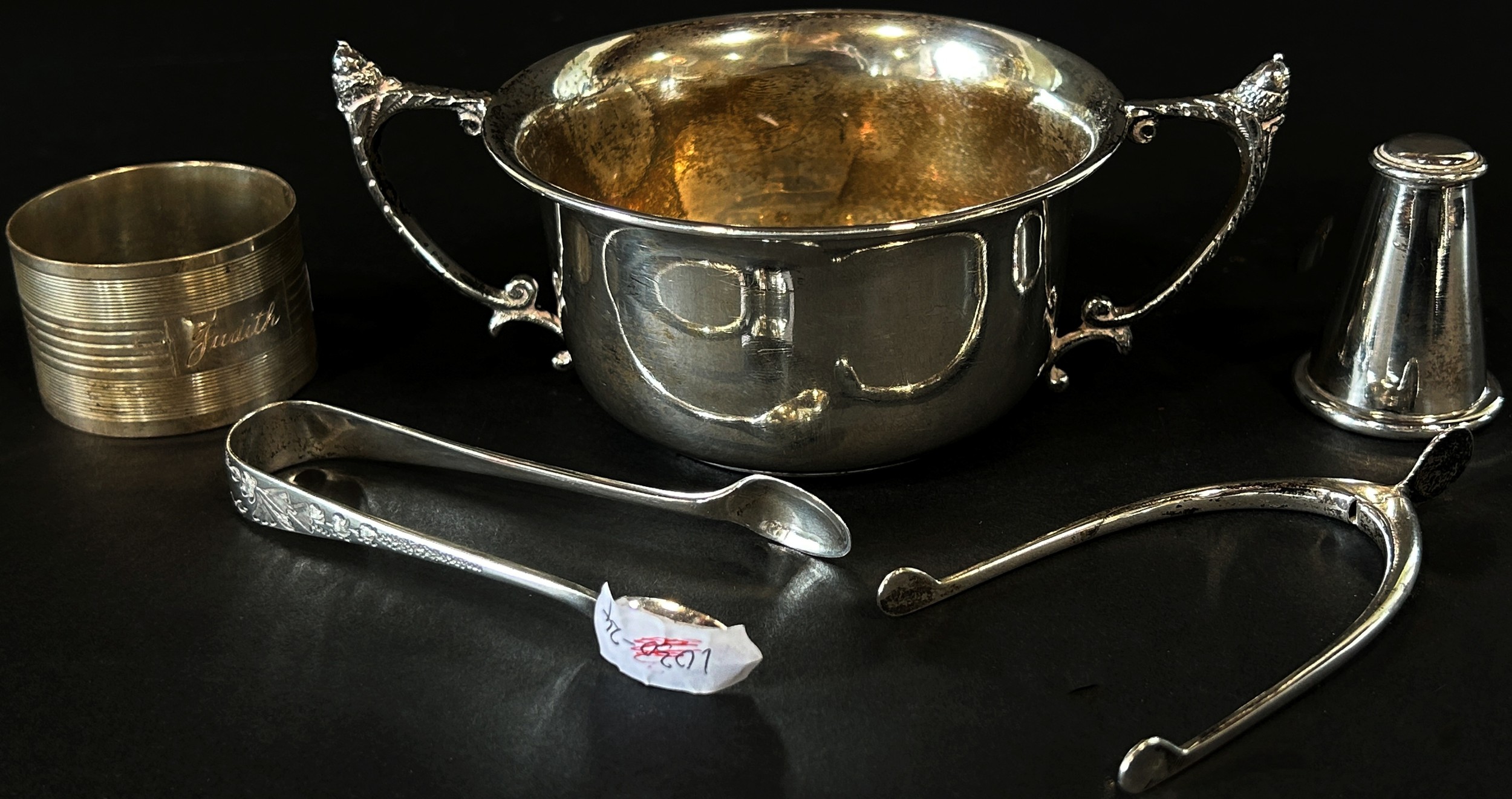 A silver two handled dish, a silver napkin ring, a silver novelty wishbone sugar tong, a sugar - Image 2 of 2