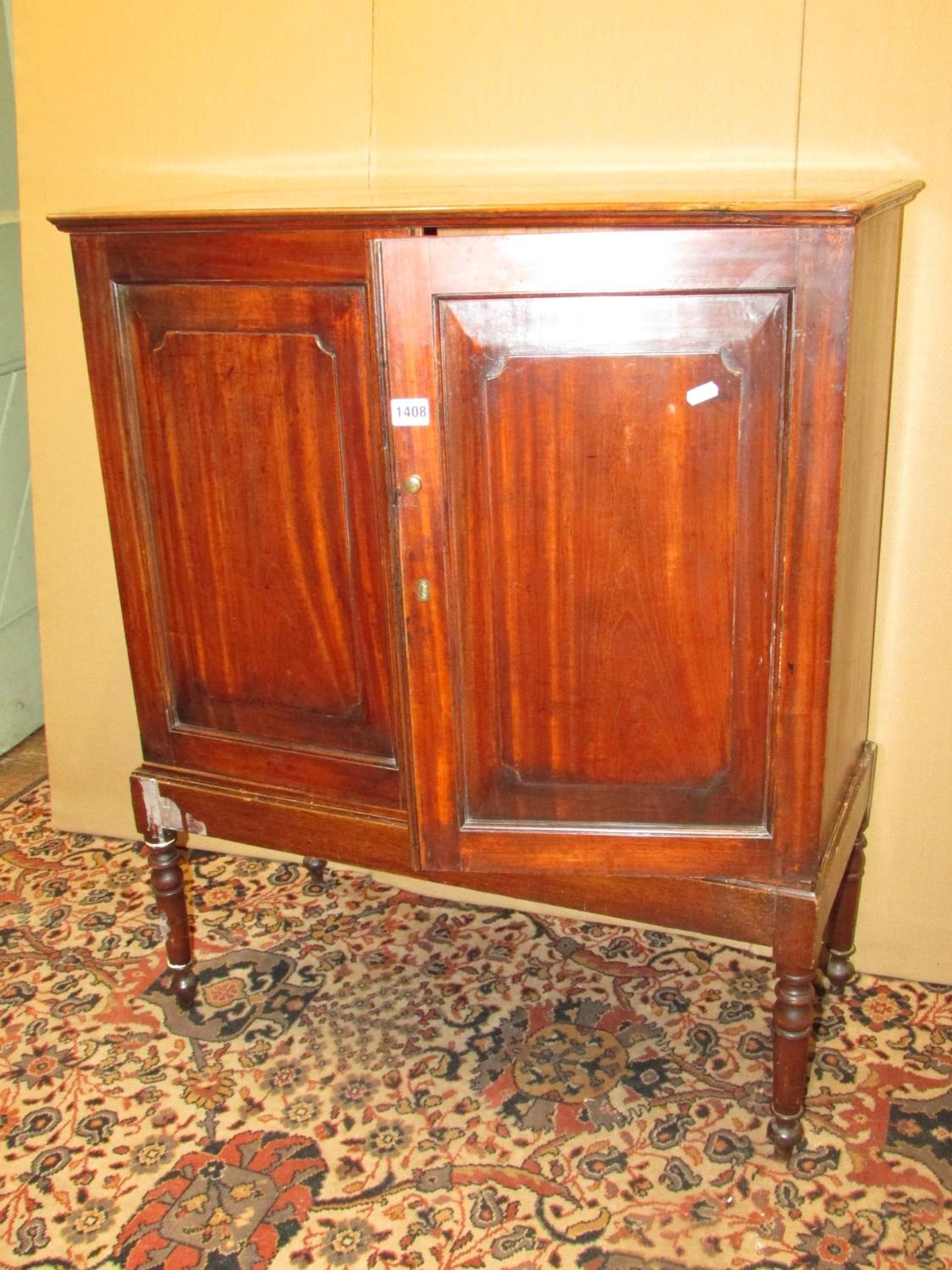 A Georgian satin wood cupboard enclosed by two fielded panelled doors, raised on an open - Image 3 of 4