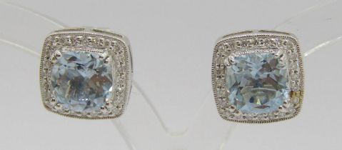 Pair of 18ct white gold aquamarine and diamond set stud earrings in the Art Deco style, maker '