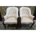 A pair of 19th century rose wood framed and upholstered drawing room chairs on cabriole legs