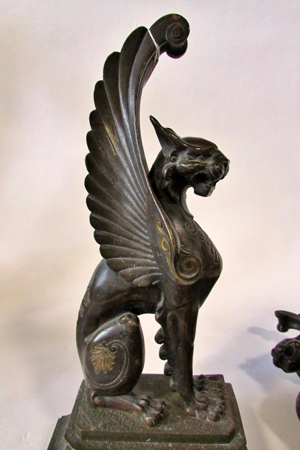A substantial pair of 19th century cast bronze gryphons, seated in profile, raised on stepped - Image 3 of 6