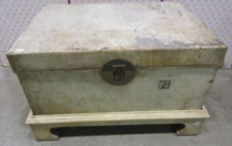 A Chinese vellum trunk on stand