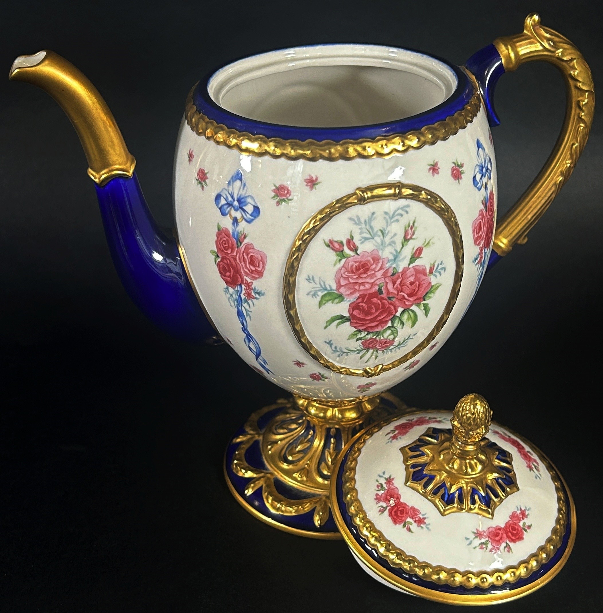 A porcelain coffee pot - the Faberge egg imperial teapot, the ivory coloured body within a blue - Image 2 of 3