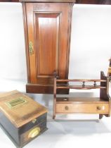 An Edwardian walnut pot cupboard, a mahogany wall mounted smokers rack with three mixing bowl