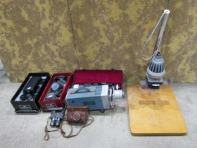 A collection of various vintage and later Cameras and equipment including AXOMAL photographic