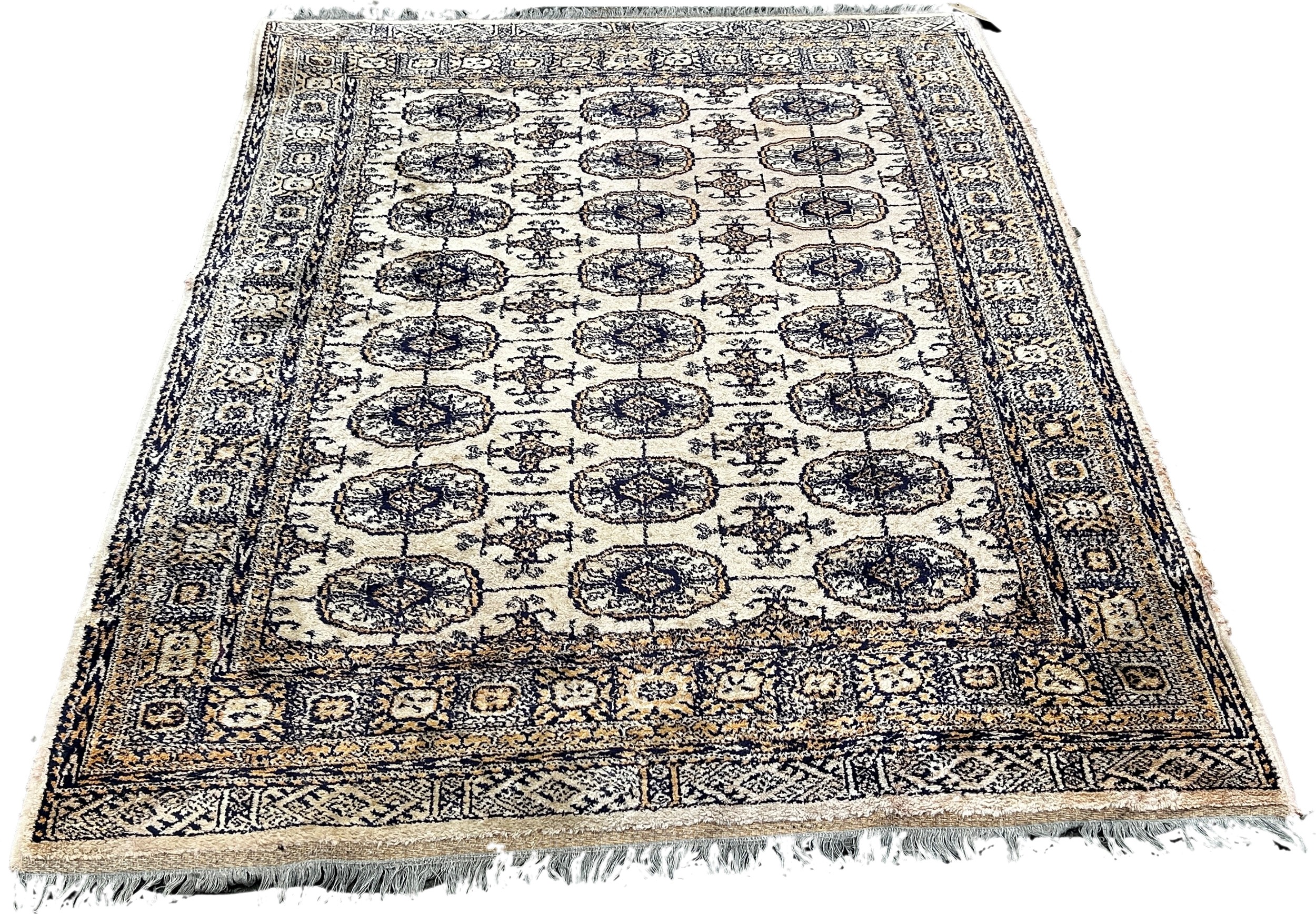 A Bokara style carpet, with three row of elephant foot blue guls on a beige ground, 185 x 130cm - Image 2 of 3