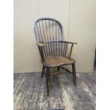 Two 19th century Windsor comb-back elbow chairs, in elm and beech (2)