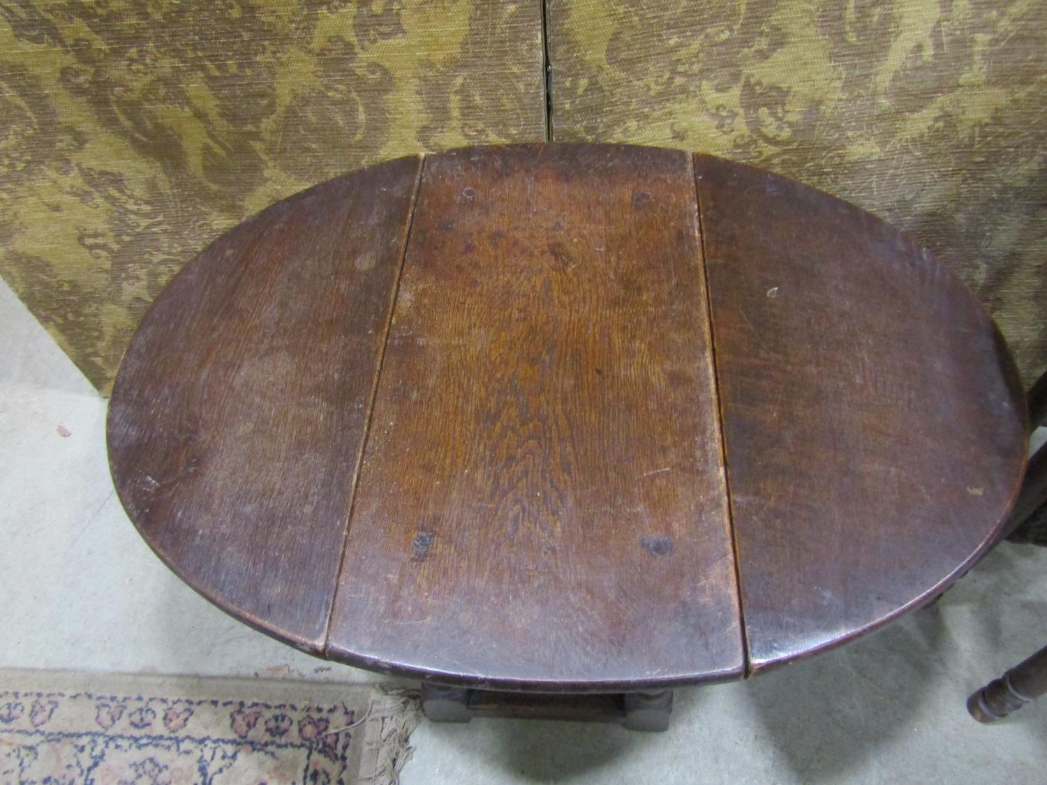 An old English oak drop leaf occasional table together with an Indian brass tray top table with - Image 3 of 4