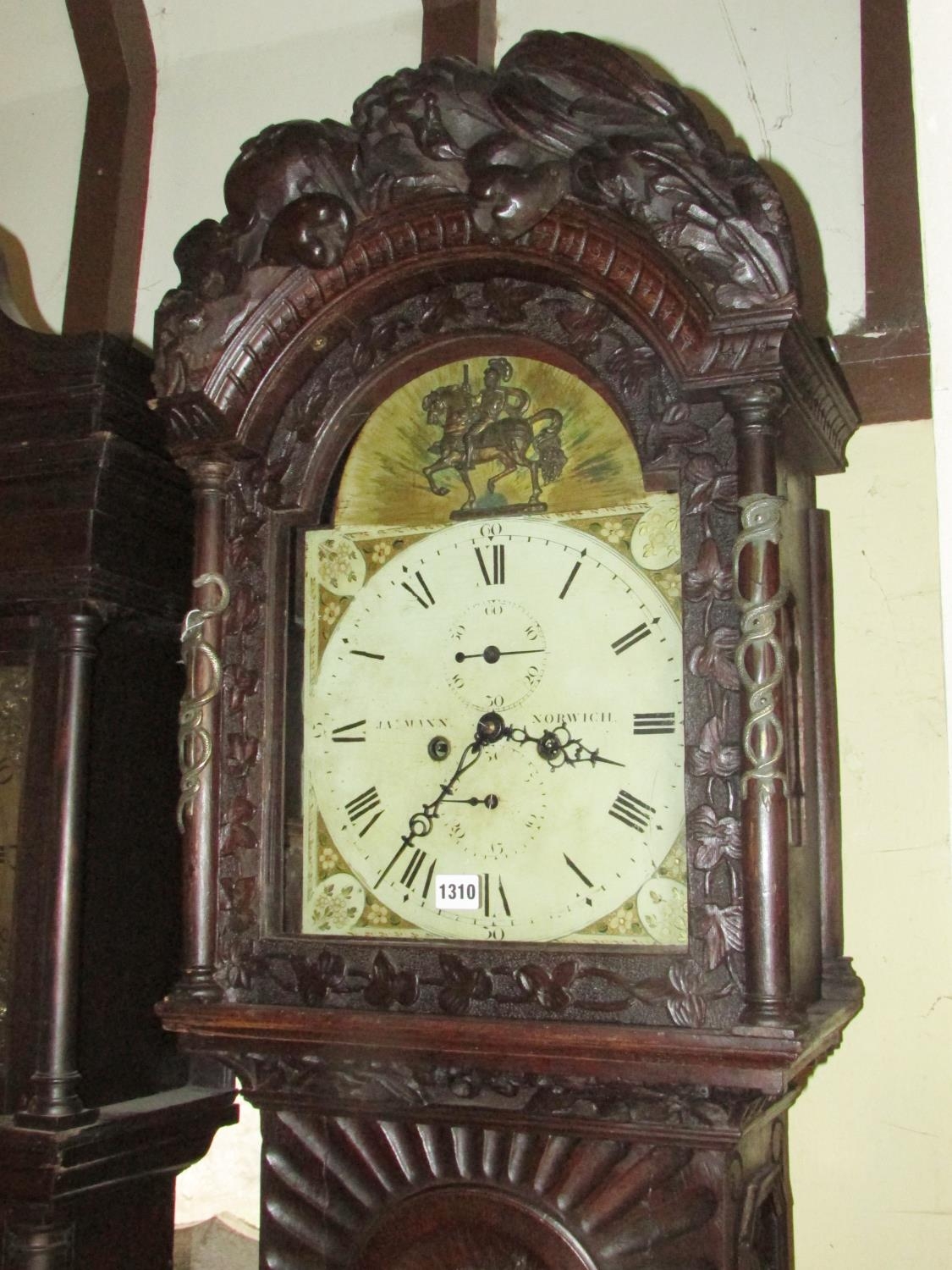 A 19th century oak longcase clock with heavy estate carving, the trunk detailing a knight fighting - Image 3 of 17