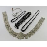 Warranted 800 silver pocket watch, EPNS pierced belt and three French jet bead necklaces (5)