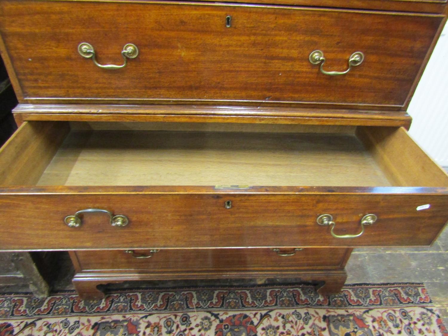 A Georgian mahogany chest on chest fitted with an arrangement of six long and two short drawers on - Image 3 of 3