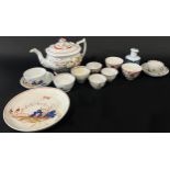 A collection of 19th century porcelain tea bowls (8), further saucers, mid 19th century teapot