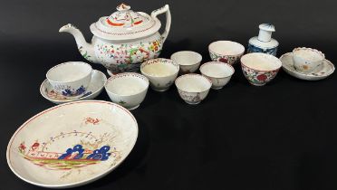 A collection of 19th century porcelain tea bowls (8), further saucers, mid 19th century teapot