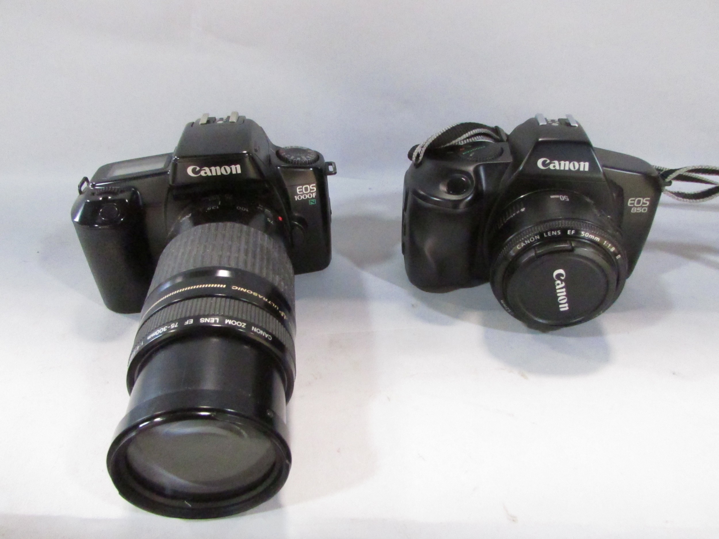 Nine Canon cameras models: EOS 80, EOS 1000F, EOS 3000V, EOS 500 N, EOS, RO AF35M, EOS 300 with - Image 5 of 12