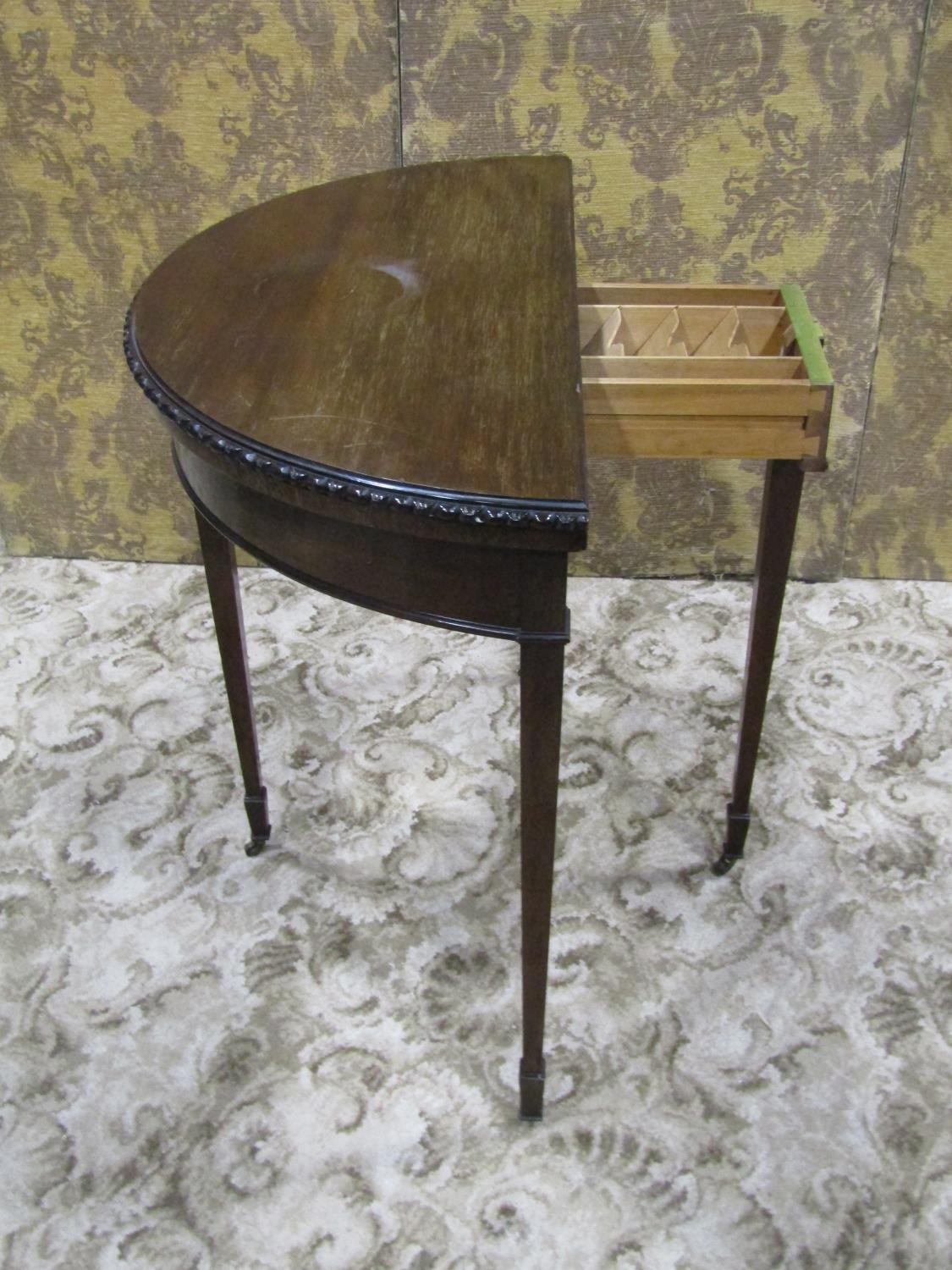 An Edwardian mahogany demi-lune fold over top card table in the Georgian style raised on square - Image 3 of 5