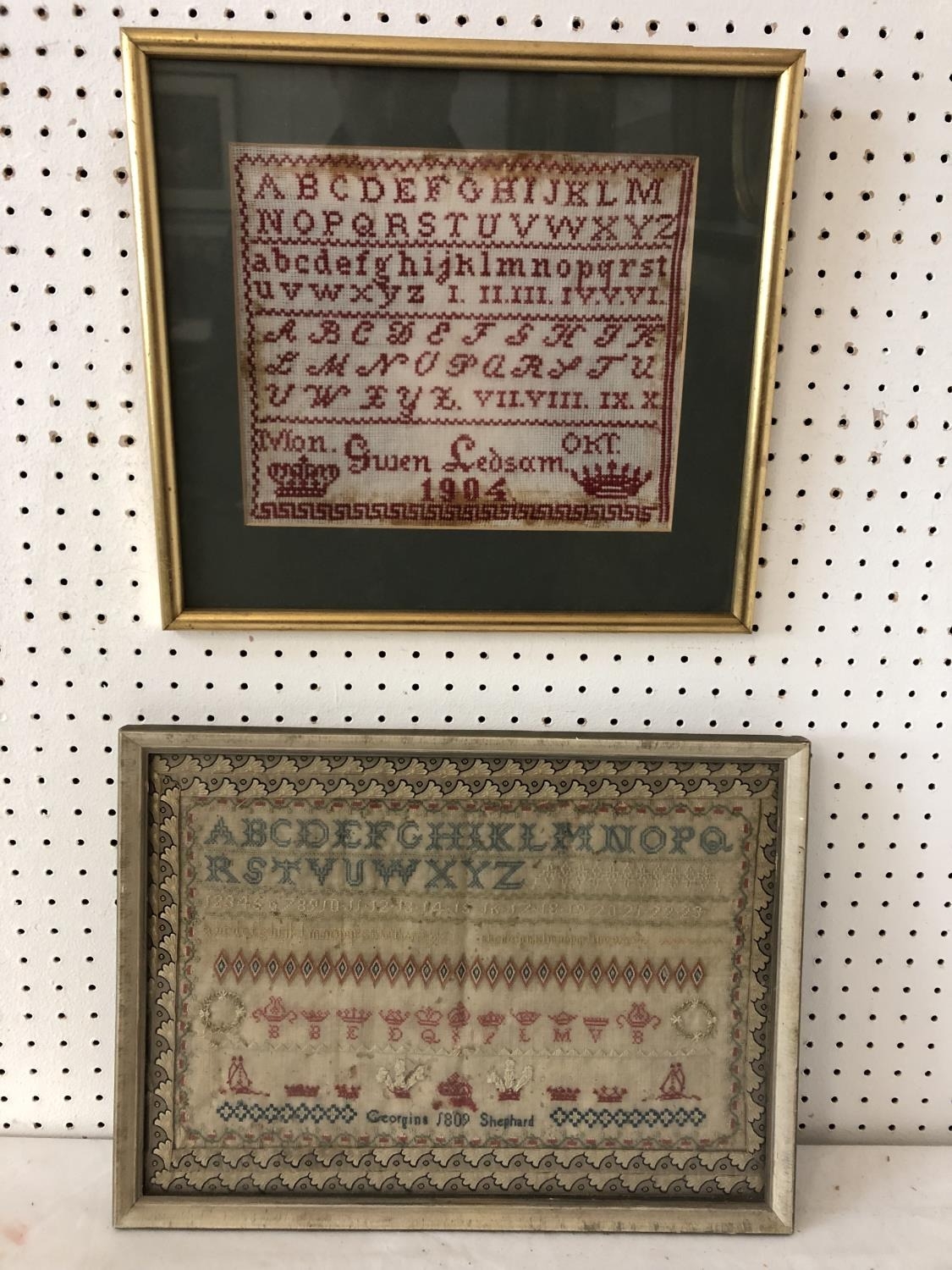 Two 19th and 20th century needlework samplers, by Georgina Shepherd, 1809, and Gwen Ledsam, 1904,