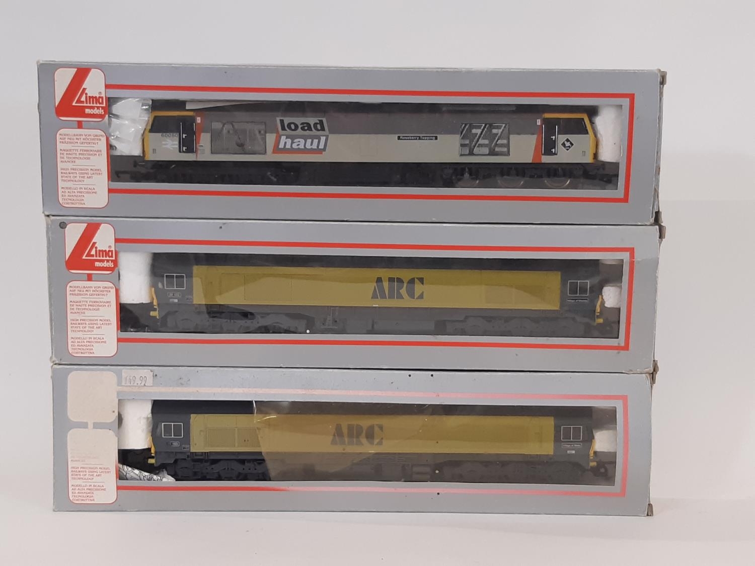 Three 00 gauge diesel locomotives by Lima comprising 59103 'Village of Mells' and 59102 'Village