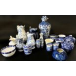 A collection of 19th century and later blue and white ware including willow pattern example,