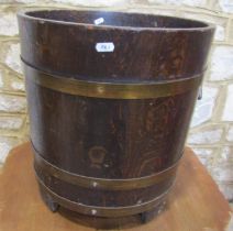 A Lister oak and brass banded floor standing tub