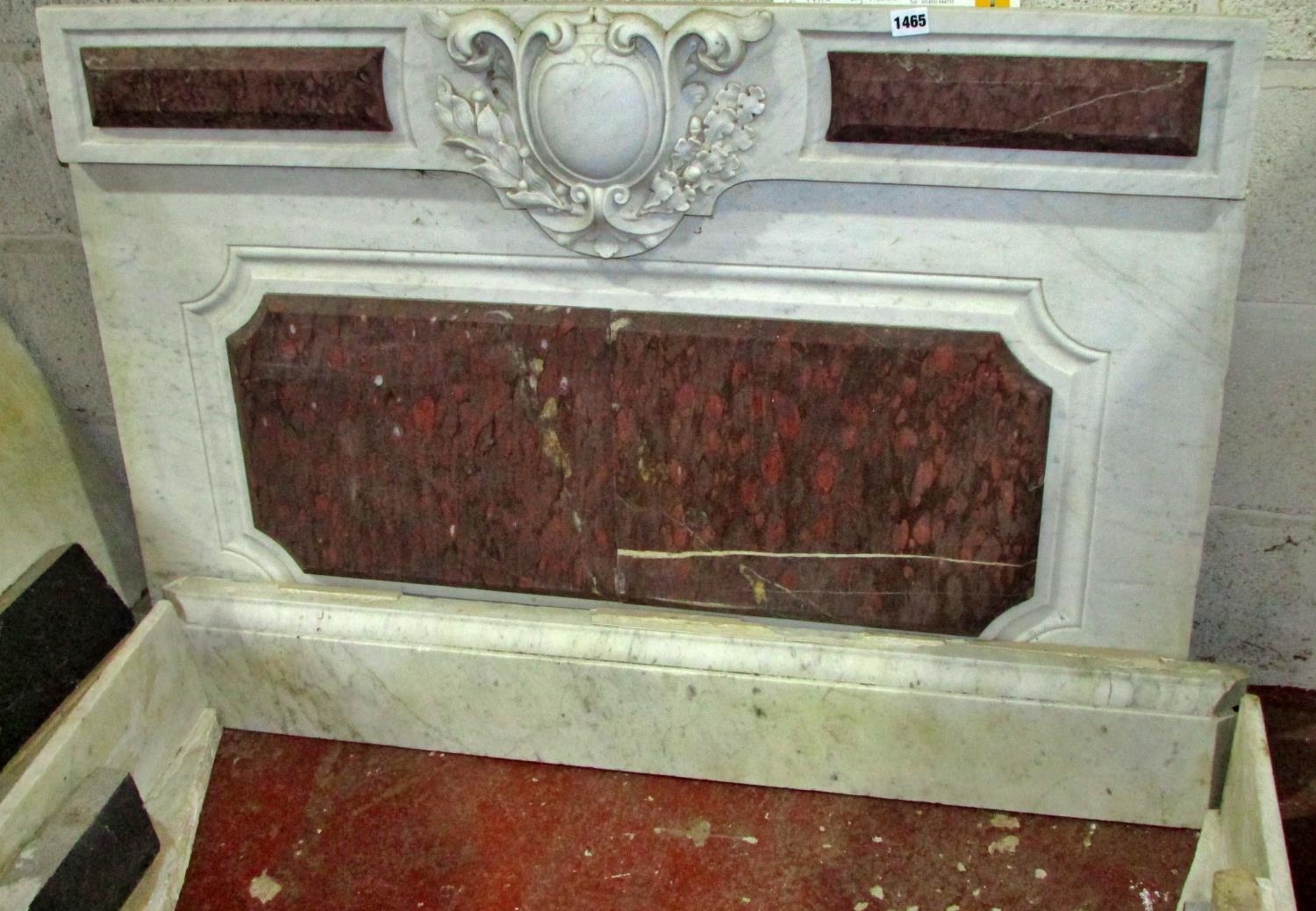 A 19th century sectional Sienna and rouge marble console table with applied panels, armorial