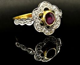 18ct oval ruby and diamond openwork cluster ring, Sheffield 1987, size O, 4.8g