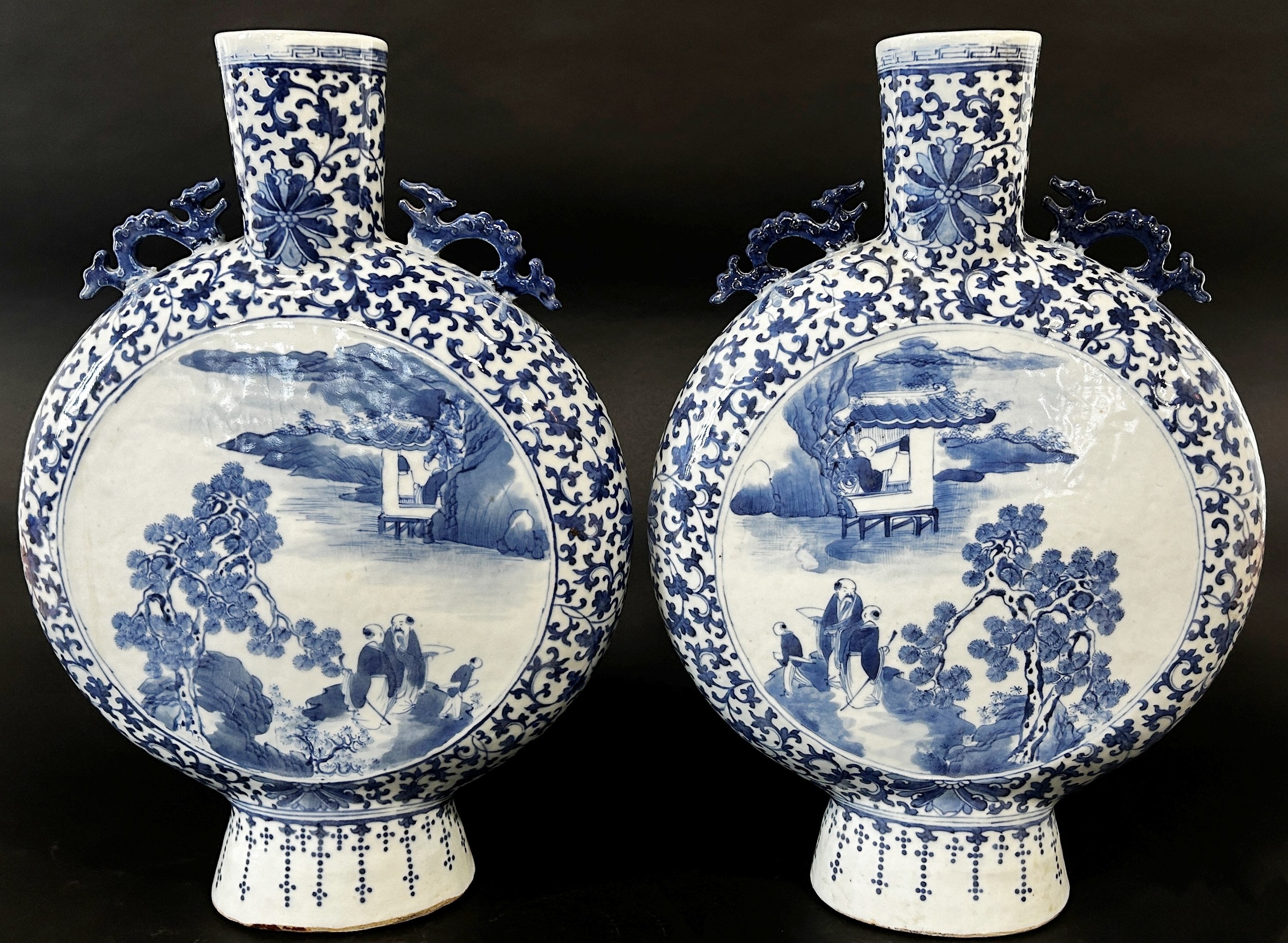 A pair of large blue and white Chinese moon flasks, Qing Dynasty showing characters in landscape - Image 2 of 4