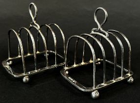 A pair of small silver toast racks, together with two vesta vestas and a Thorens cigarette