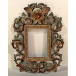 A good quality 19th century continental carved walnut picture frame, in the Florentine style, with