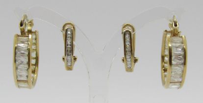 Pair of yellow metal channel set baguette-cut diamond earrings, 1.7g and a further 9ct pair set with