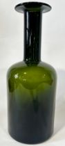 A Holmegaard tall dark green glass bottle by Otto Brauer (51cm high)