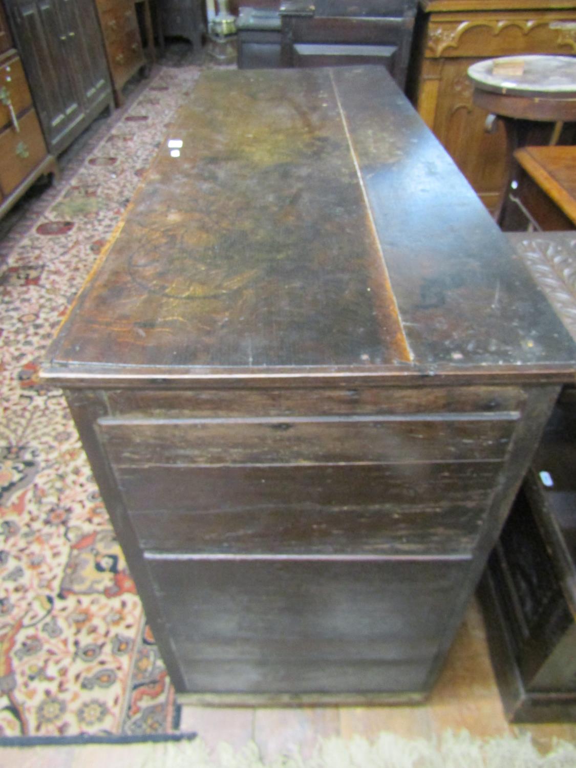 A Georgian oak dresser base with two frieze drawers and two panelled doors, with iron butterfly - Image 2 of 3