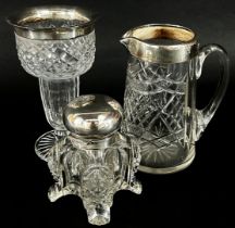 A substantial cut glass inkwell with a silver hinged cap (chip to base) cut glass jug with silver