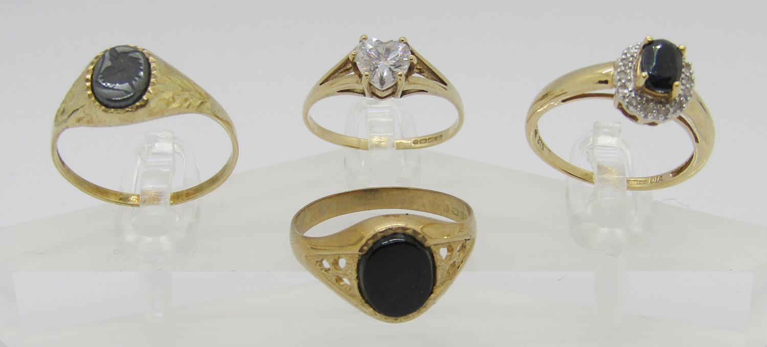 Four 9ct rings comprising a sapphire and diamond cluster example, an onyx signet, a further - Image 2 of 4