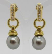 A pair of 18ct Tahitian pearl and diamond earrings, the pearls on simple drop mounts each set with a
