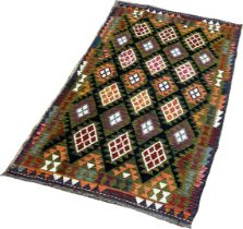 A Mimana Kilim with an overall field of multicoloured diamonds, 200 x 217cm approximately