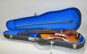 An old violin with a label to the interior Antonius Stradivarius Cremonenfis Faciebat Anno 1725,