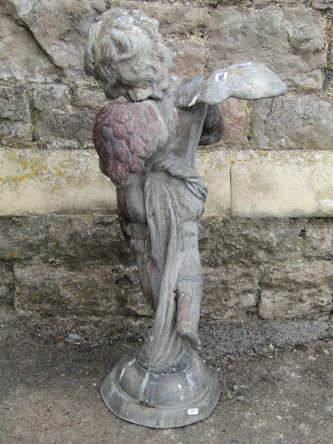 A 19th century lead water fountain in the form of a winged cherub clasping a fish, 80cm high - Image 2 of 5