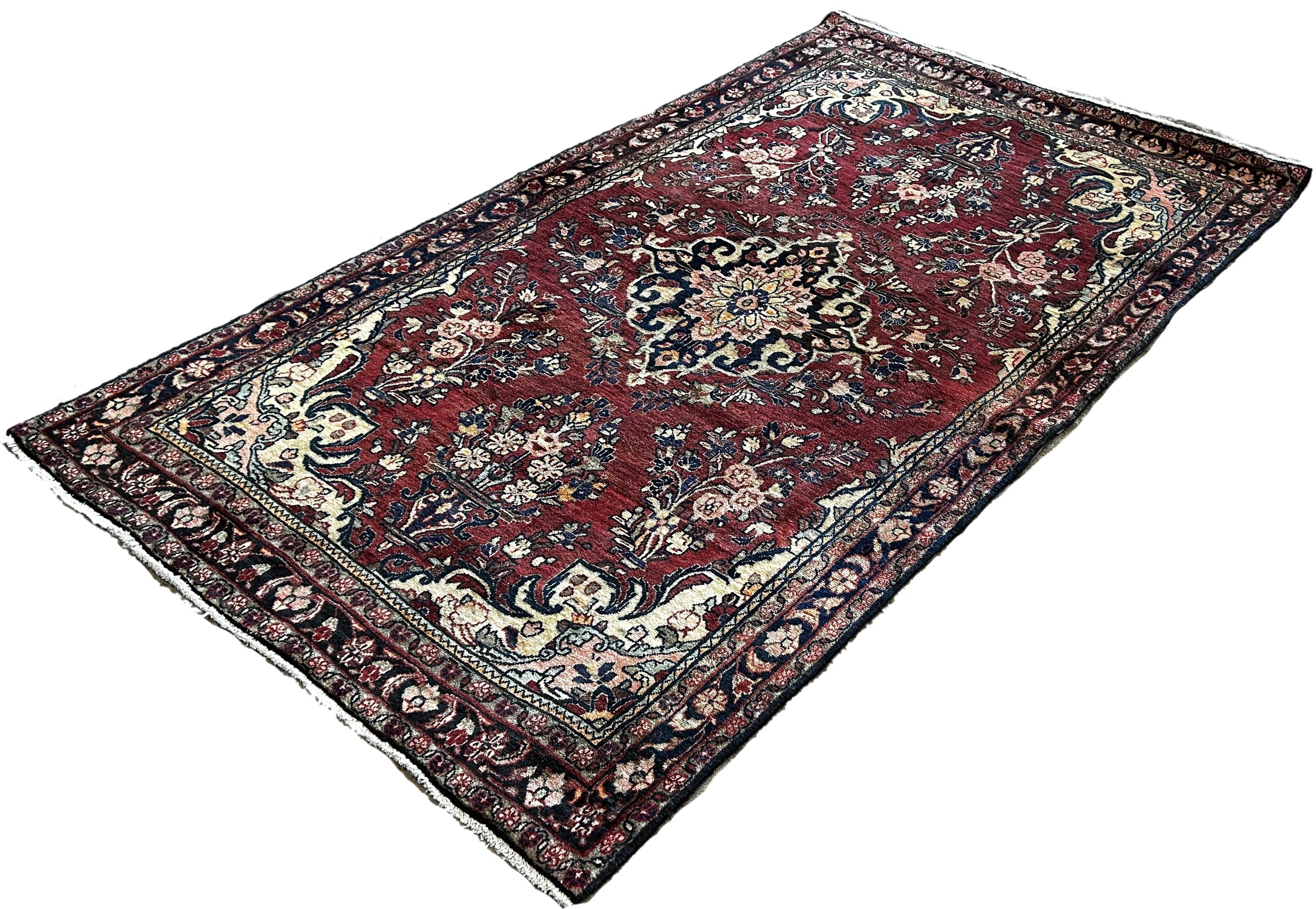 North West Persian Sarouk Mahal Rug, with a central floral medallion with clusters of flowers on a