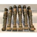 A group of six late 18th / 19th century Flemish carved oak figural mounts / adornments, 63cm high,