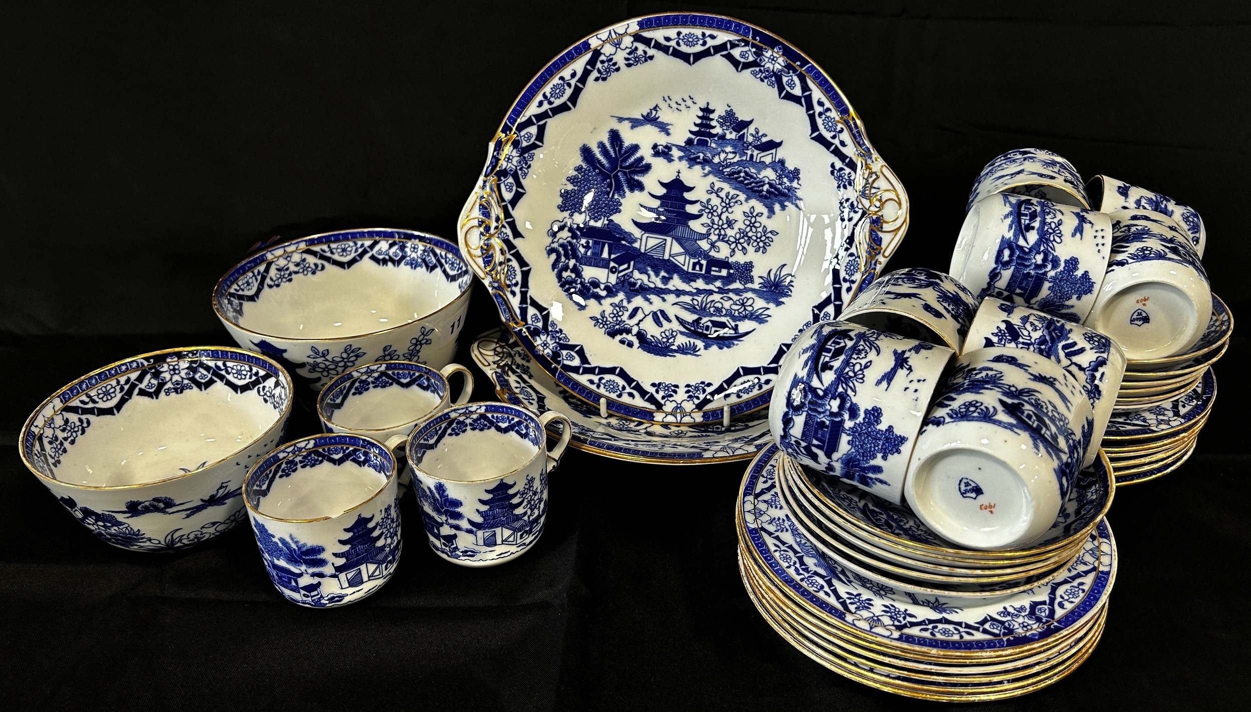 A Grainger Worcester blue and white tea set with chinoiserie detail, banded borders, to include side