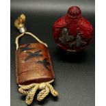 A four sectional Chinese lacquer inro of crows, two carved hard wood netsuke figures of animals