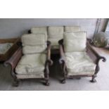 An good 19th century mahogany three piece bergere suite, the carved show wood frame with acanthus,