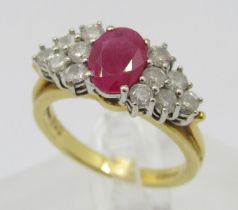 18ct oval ruby and stepped diamond cluster cocktail ring, maker 'CJW', Sheffield, size N/O, 6.4g