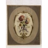 A French Aubusson painted panel, with a central floral spray and scrolling oval border, gouache on
